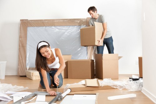 Furniture removals team planning a move in Roehampton residential street