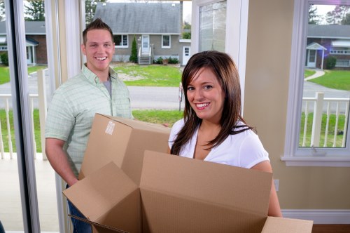 Office relocation planning in Roehampton with moving boxes and business furniture