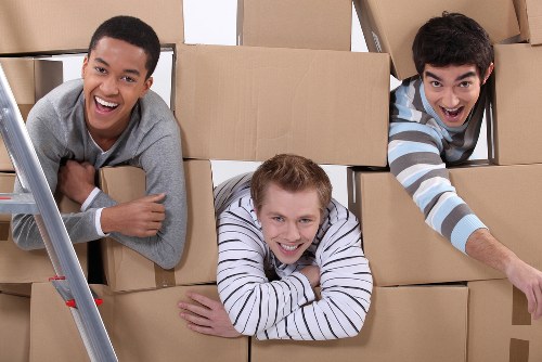 Removal van and packed boxes prepared for a house move in Roehampton