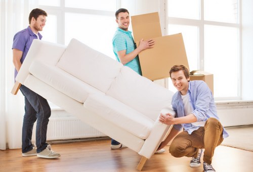 Packing and loading belongings into a moving truck in Roehampton