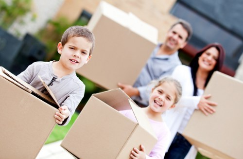 Team loading boxes and furniture for a home move in Roehampton