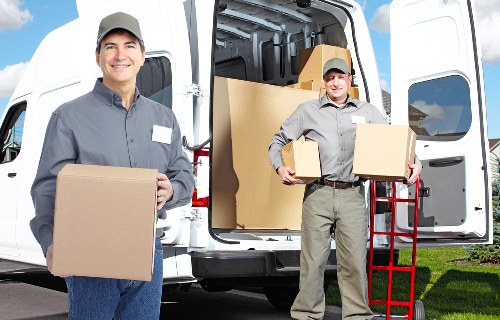 Loading furniture and boxes for an urgent local removal in Roehampton