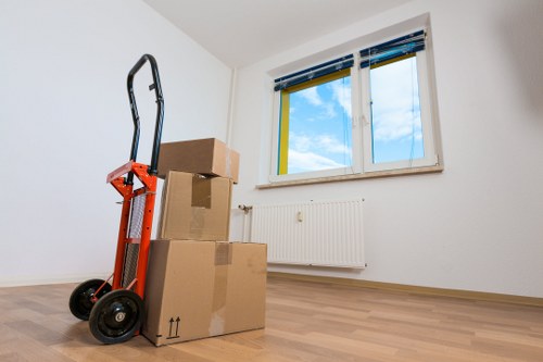 Mover using protective equipment while carrying furniture