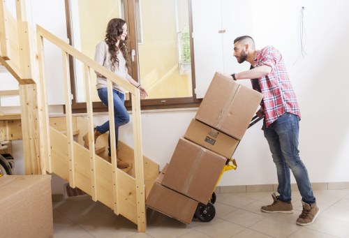 Loading furniture from a Roehampton flat into a removal van