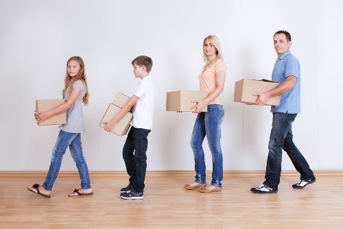 Packed furniture and boxes prepared for transport by movers
